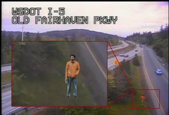 The same camera frame with a red box around a small orange figure on the shoulder, and an enlargement of it showing me standing there.