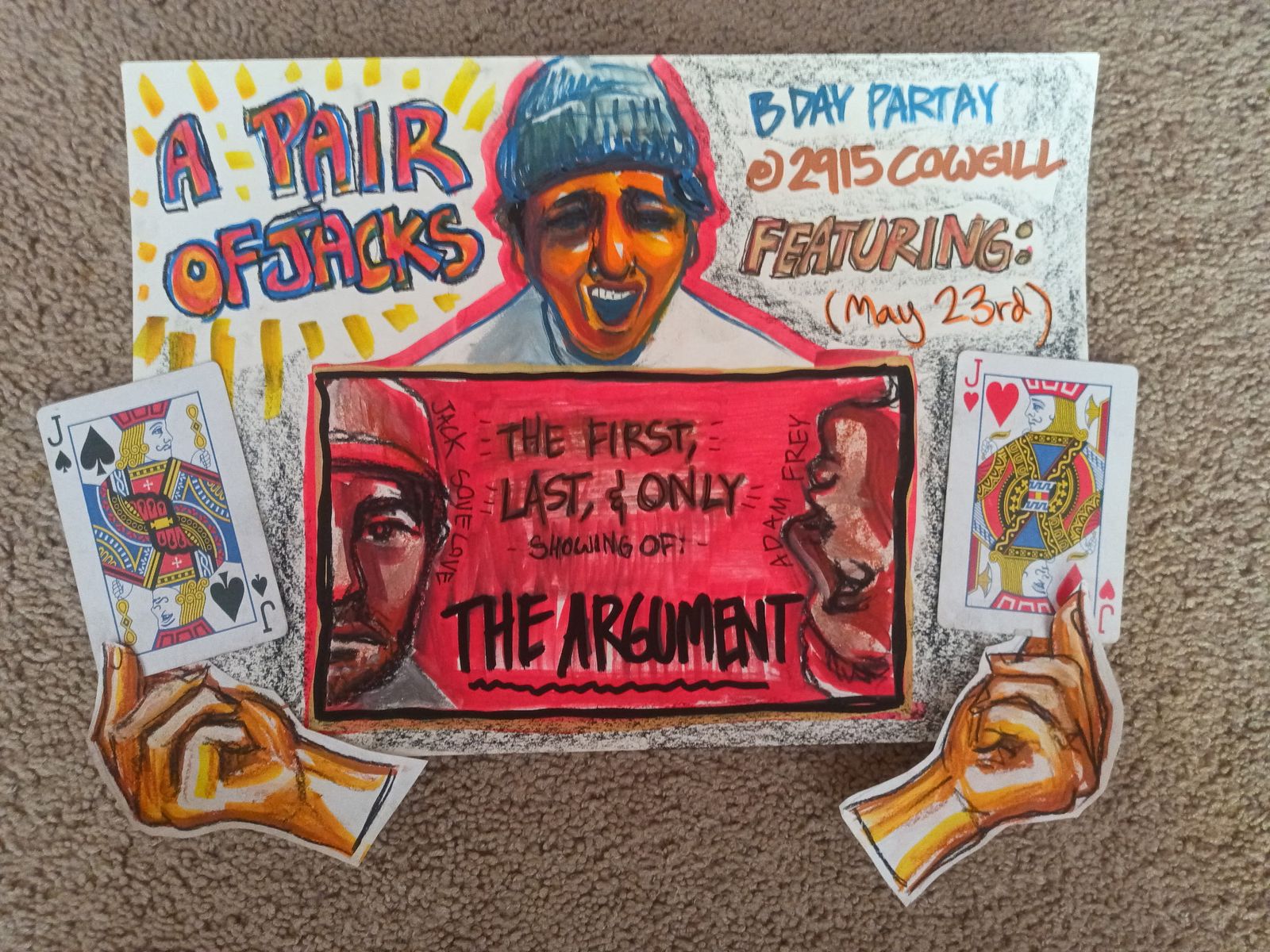 The hand-drawn poster, photographed on carpet between a real jack of spades and jack of hearts, each held by a cut-out drawing of a hand. Across the top, A PAIR OF JACKS beside a portrait of a grinning man in a blue beanie, and B DAY PARTAY @ 2915 COWGILL, FEATURING: (May 23rd). In the middle a red panel flanked by two facing profiles labelled JACK SOVELOVE and ADAM FREY reads THE FIRST, LAST, & ONLY SHOWING OF: THE ARGUMENT.